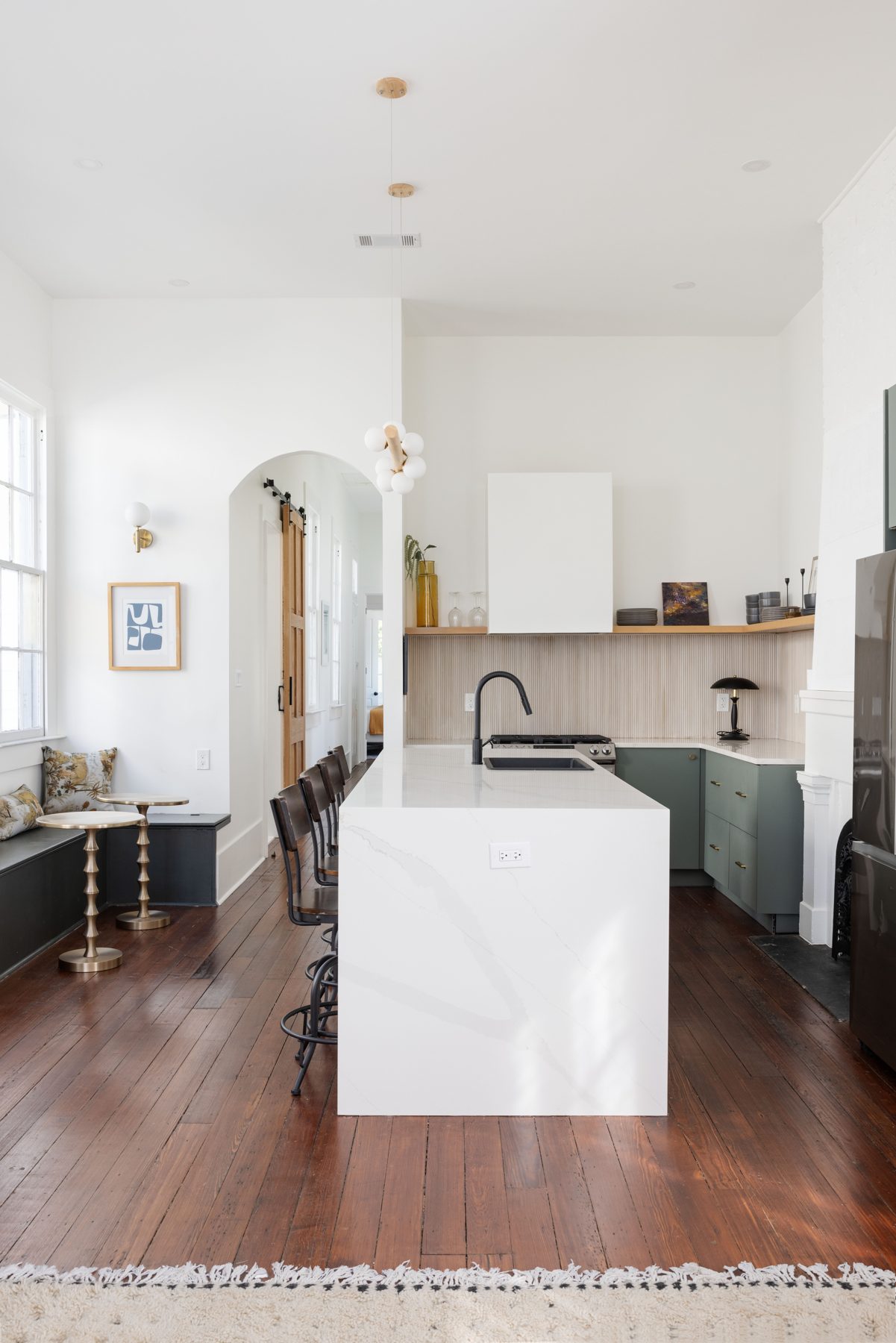 Carondelet kitchen with island and sage cabinets